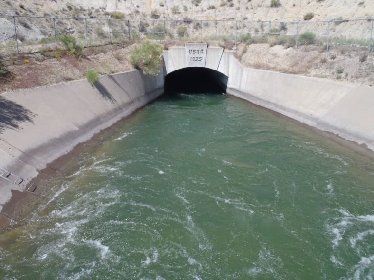 NAPI had a devastating 2016. It's sole source of water was shut off for a month. A 17-foot wide siphon pipe burst seven miles from the farm. Shown here: a canal and tunnel that is part of the system delivering water to NAPI from a reservoir 40 miles away.